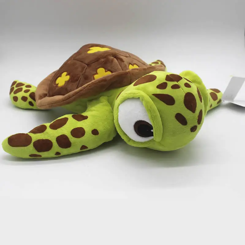 Sköldpadda gosedjur, lång och mjuk, med originaldesign från Finding Nemo, 40 cm 16 Visa den gröna sköldpaddan med brunmönstrat skal mot ljus bakgrund.