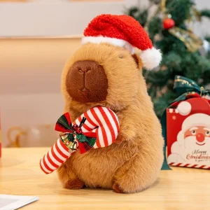 Alternative view of Kapybara gosedjur i kawaii-stil med tomteluva, julgran och polkagris som juldekoration