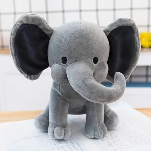 Elefant gosedjur som mjuk sovdocka, för bekväm vila och sömn i rosa eller grått