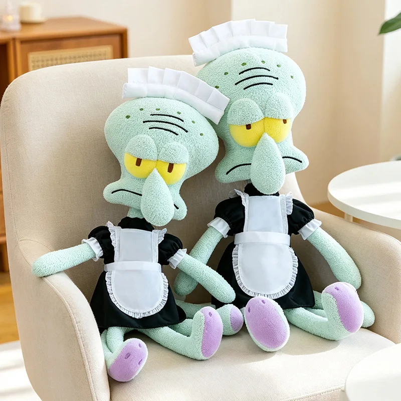 Squidward Quincy Tentacles gosedjur som bläckfiskkudde i tecknad stil, 40–50 cm 20 Två mintgröna bläckfiskplyschfigurer i vita mössor och förkläden sitter på en stol.