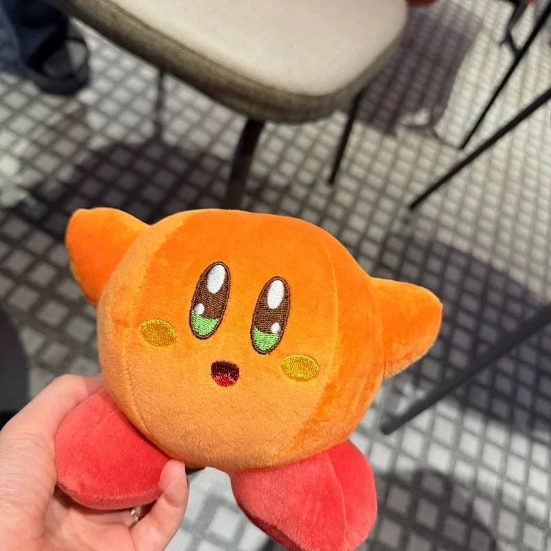 Samlarfigur i form av en orange Kirby-docka med arg min och tecknad spelstil 11 Samlarfigur i form av en orange Kirby-docka med arg min och tecknad spelstil - Bild 11