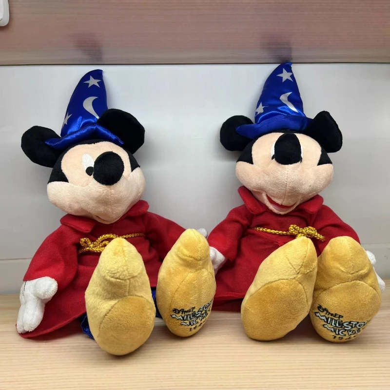 Mus gosedjur, Magician-themed och Anniversary-themed, disney fantasia mickey mouse 21 Visa de två sittande musplyschfigurerna med röda magikerdräkter och blå stjärnhattar.