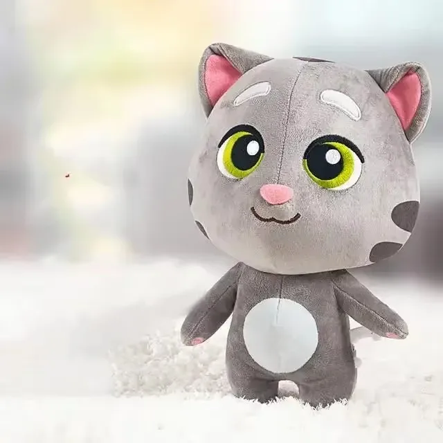 Talking Tom katt gosedjur som upprepar det du säger, mjuk plyschkudde, 28 cm 24 Grå kattfigur med gröngula ögon och ljus mage, fotograferad framifrån.