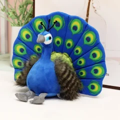 Blågrönt peacock gosedjur med utslagen solfjäderstjärt och kreativ utformning