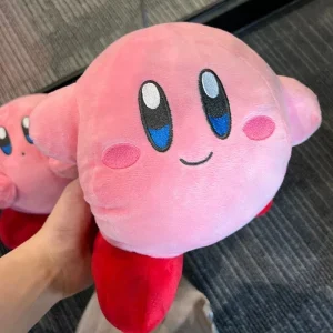 Samlarfigur i form av en orange Kirby-docka med arg min och tecknad spelstil 69 Samlarfigur i form av en orange Kirby-docka med arg min och tecknad spelstil
