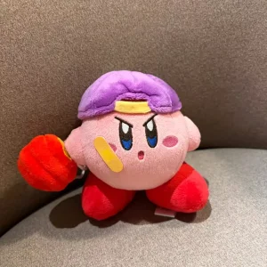Samlarfigur i form av en orange Kirby-docka med arg min och tecknad spelstil 62 Samlarfigur i form av en orange Kirby-docka med arg min och tecknad spelstil