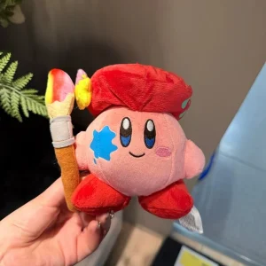 Samlarfigur i form av en orange Kirby-docka med arg min och tecknad spelstil 52 Samlarfigur i form av en orange Kirby-docka med arg min och tecknad spelstil