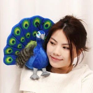 Blågrönt peacock gosedjur med utslagen solfjäderstjärt och kreativ utformning