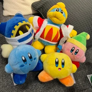 Samlarfigur i form av en orange Kirby-docka med arg min och tecknad spelstil 38 Samlarfigur i form av en orange Kirby-docka med arg min och tecknad spelstil