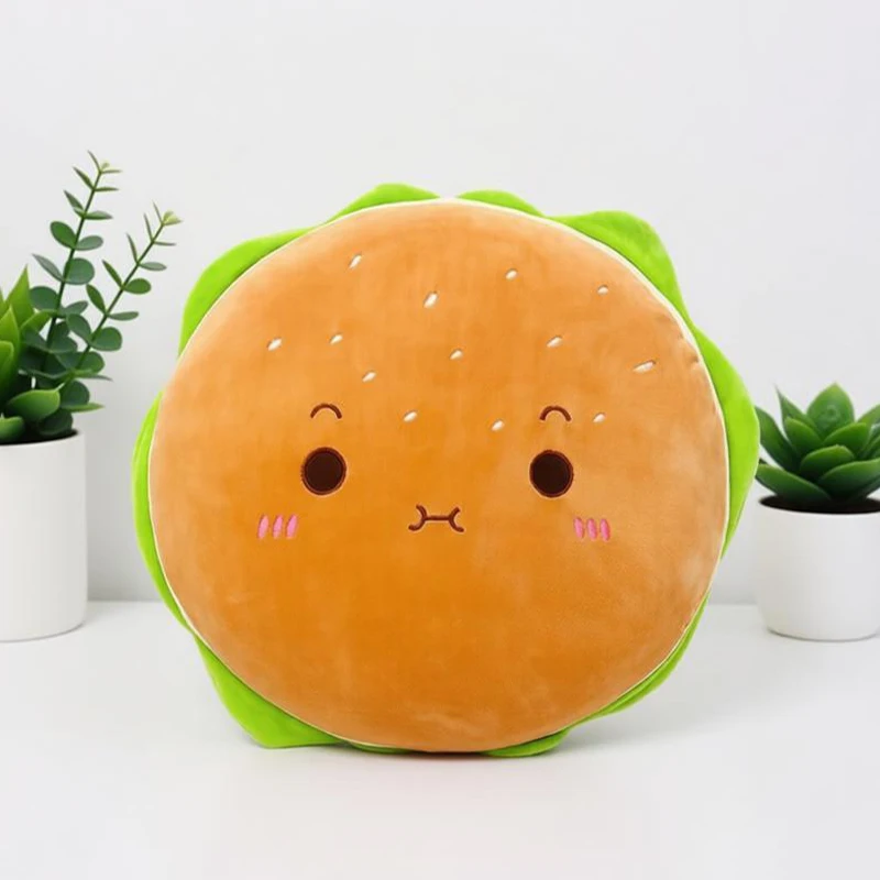 Hamburgerformat gosedjur i flera figurvarianter, fluffig plyschkudde, 40 cm 22 Hamburgerformad plysch med grönt salladsblad och ett ansikte med små ögon och nos.