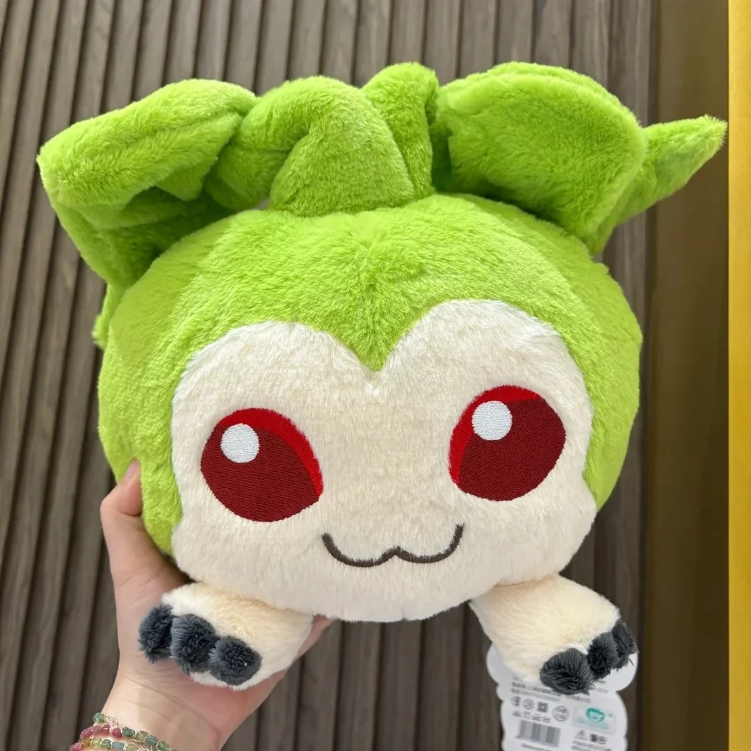Tanemon gosedjur, anime och söt, digimon kanin asköverdrag terriermon 25 Grön långörad mjuk figur visad i handen mot en grå bakgrund.