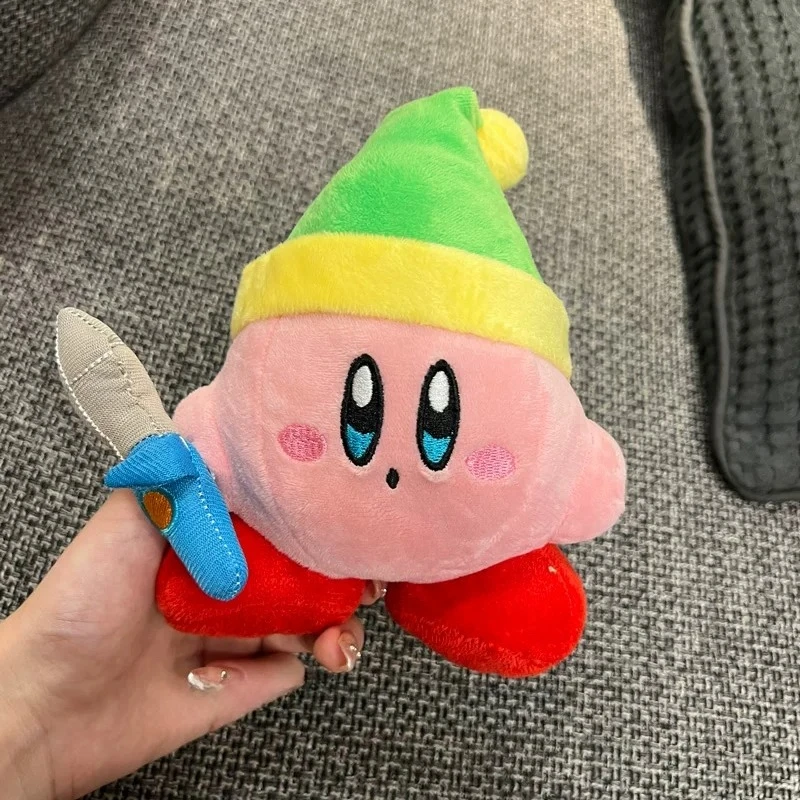 Samlarfigur i form av en orange Kirby-docka med arg min och tecknad spelstil 13 Samlarfigur i form av en orange Kirby-docka med arg min och tecknad spelstil - Bild 13