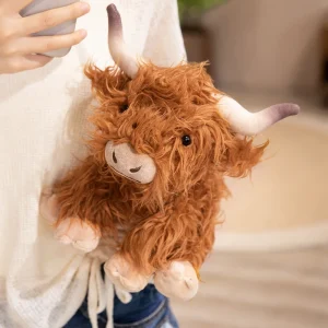 Ko gosedjur med lång, fluffig päls, realistisk Highlandstil och tre olika poser